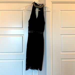 Black with silver/pearl beading to neckline. Worn once! Black Lacey overlay.